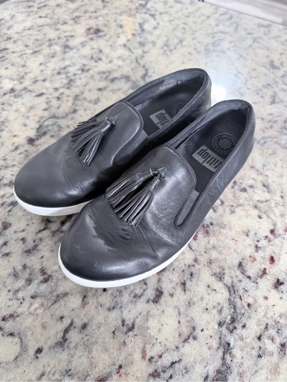 FitFlop Black Leather Tassel Slip-On Flats